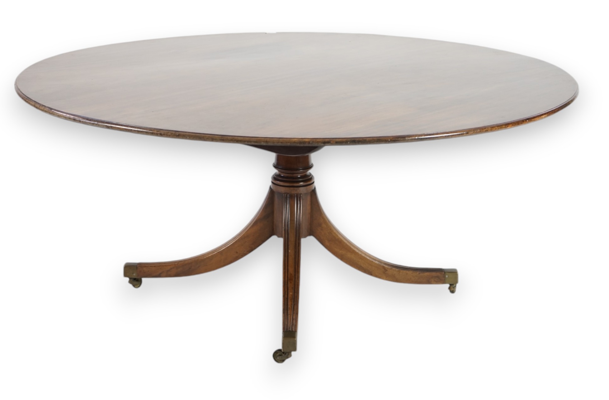 A William Tillman Regency style mahogany circular top breakfast table